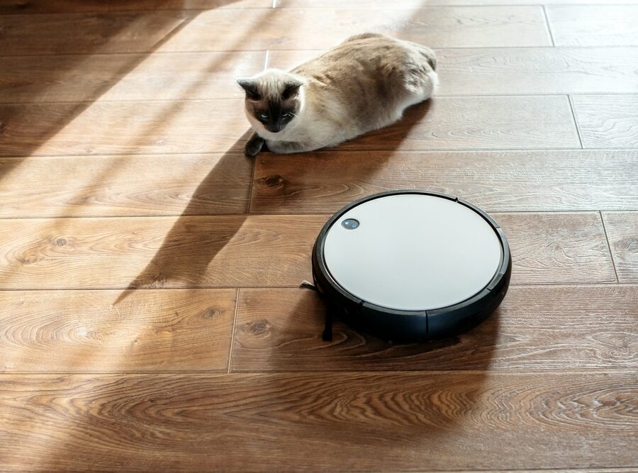 Modern,Robot,Vacuum,Cleaner,Performs,Automatic,Cleaning.,Smart,Home.,Automated